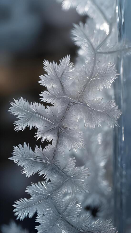 Detailed close-up of vertical ice crystal formations on a window, featuring blurred areas for copy placement. photo