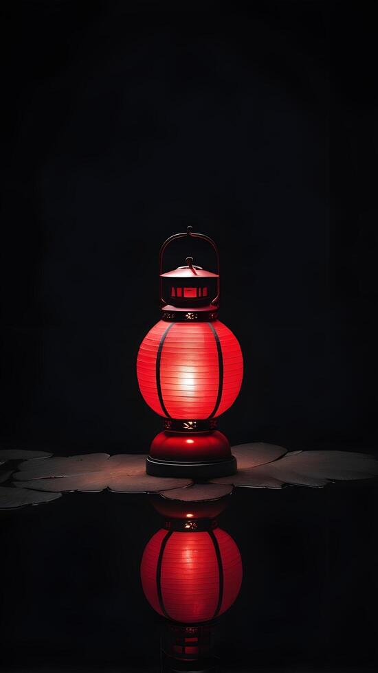 a serene scene featuring a single red lantern reflected on a smooth, dark surface. The background should have room for text above or below the lantern. photo