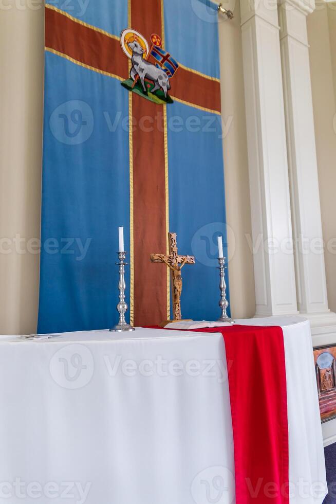 Religious Altar with Crucifix, Candles, and Christian Iconography photo