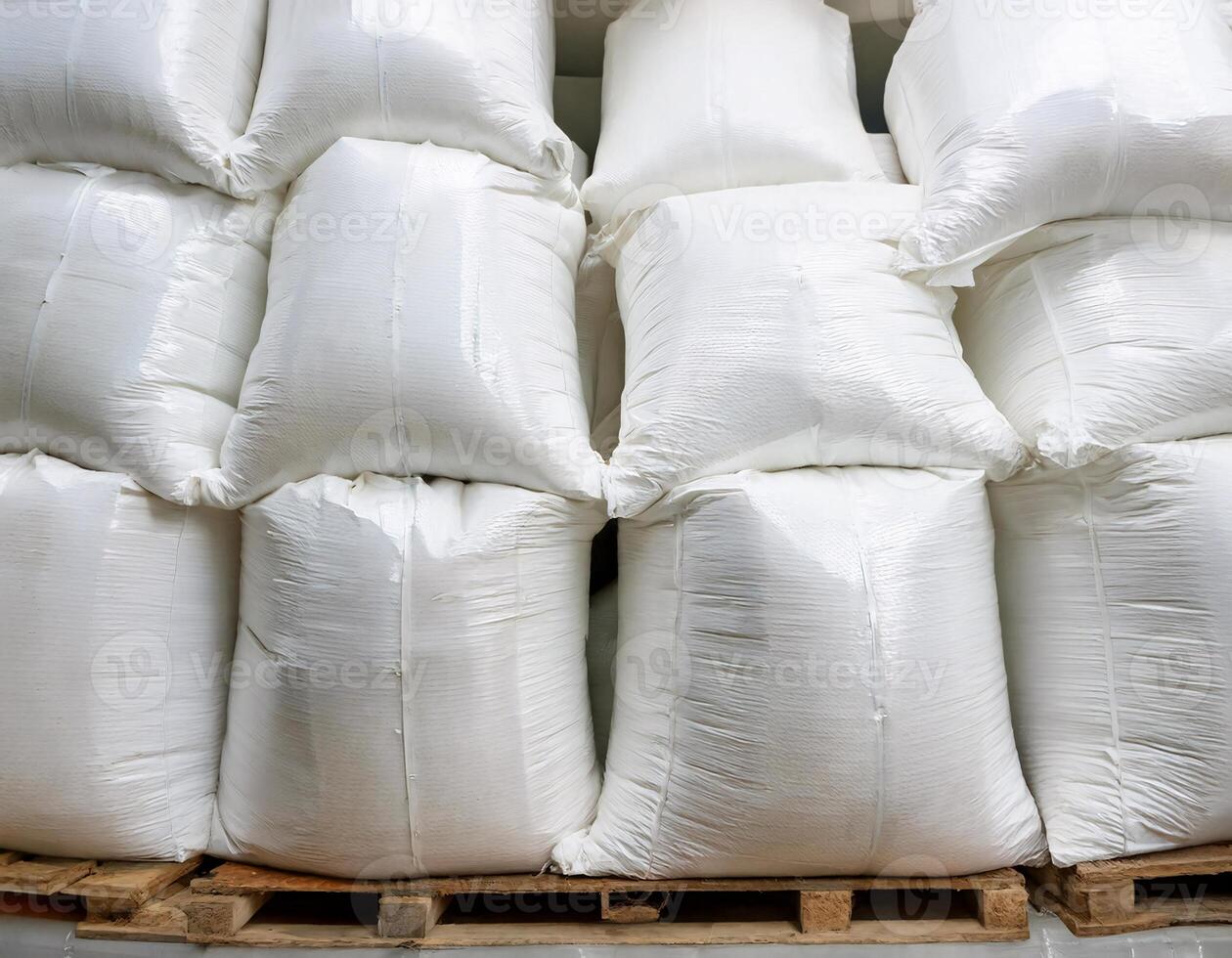 Numerous White Bags Organized in a Warehouse Ready for Dispatch photo