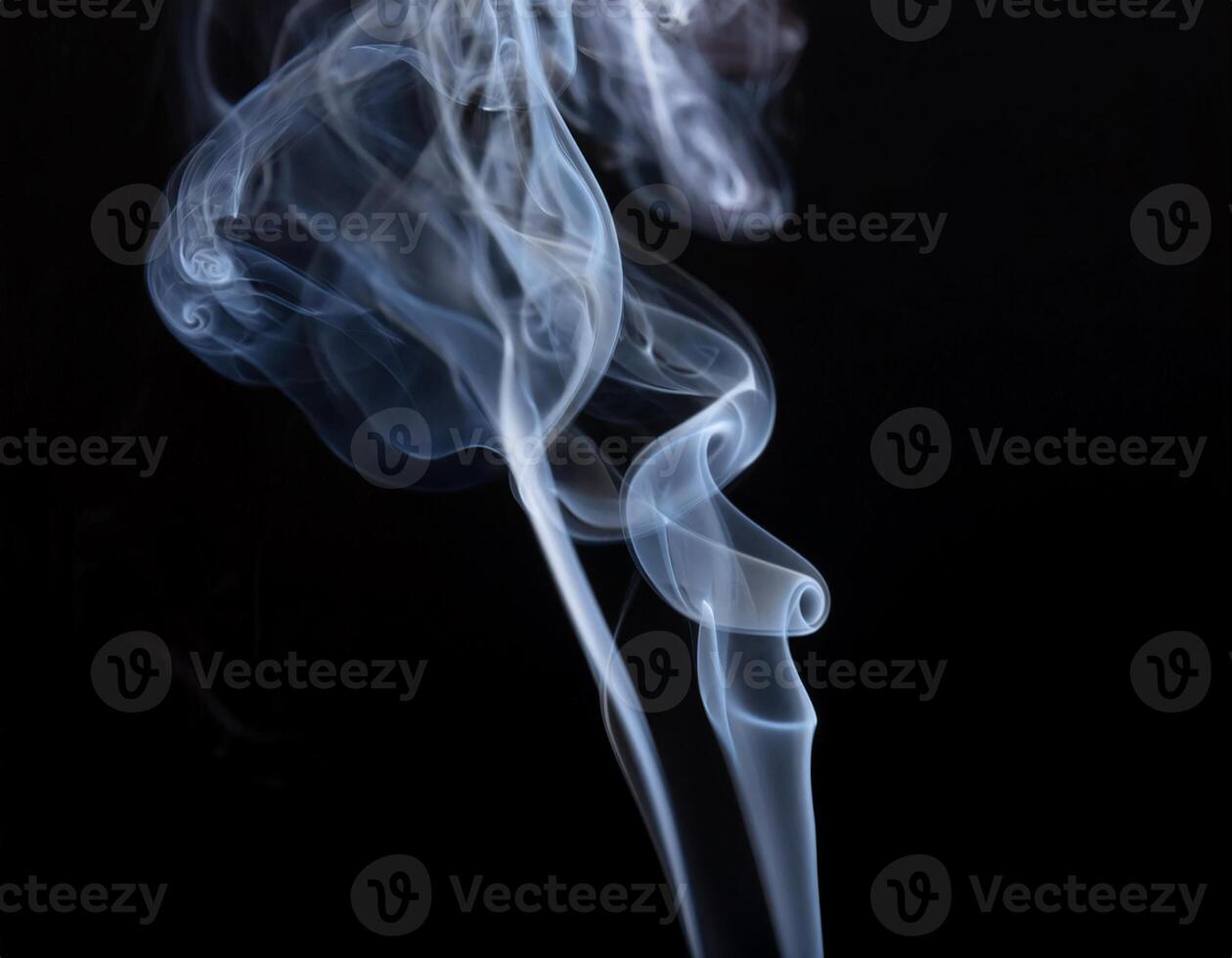 White smoke drifted against the pitch black background, photo