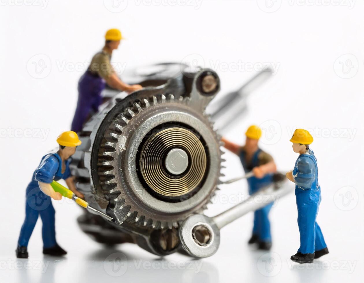 Creative Craft Miniature Worker Repairing a Small Motorcycle photo