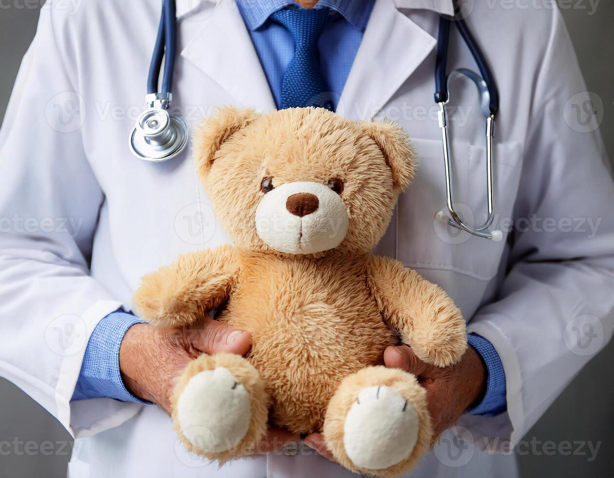 Kindness Displayed. Doctor Holding Plush Toy with White Background photo