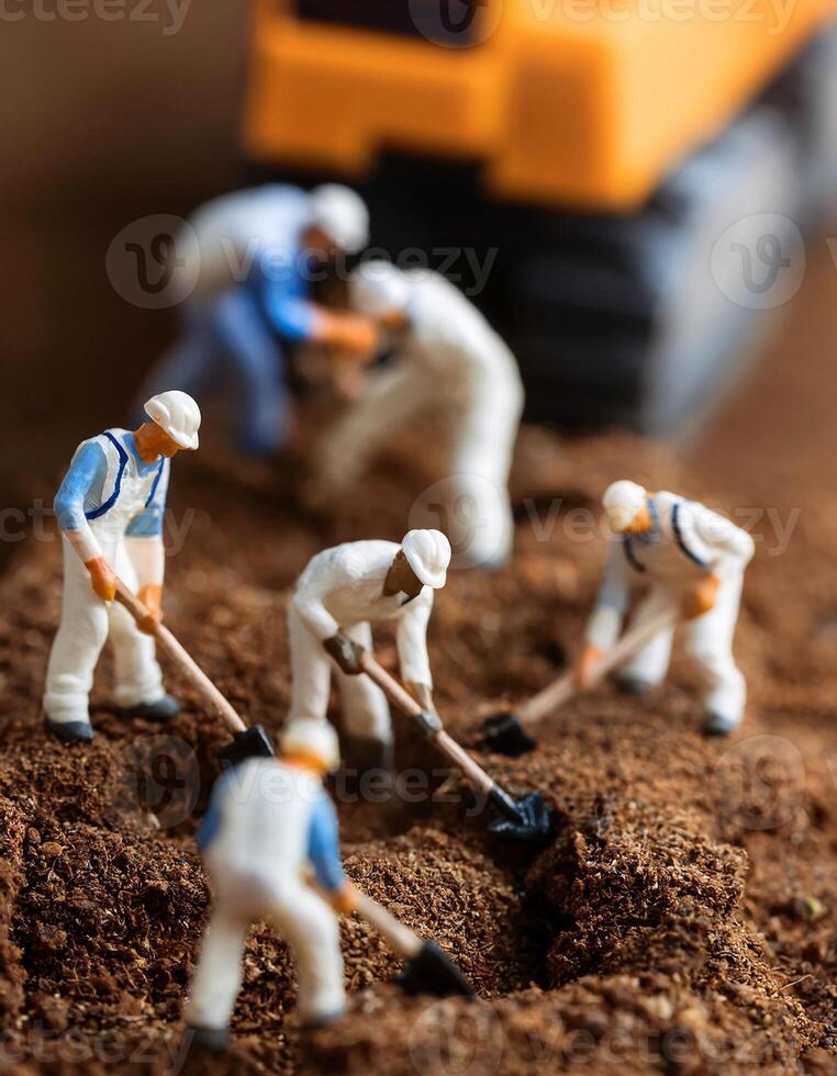workers are diligently digging the ground at a construction site, photo