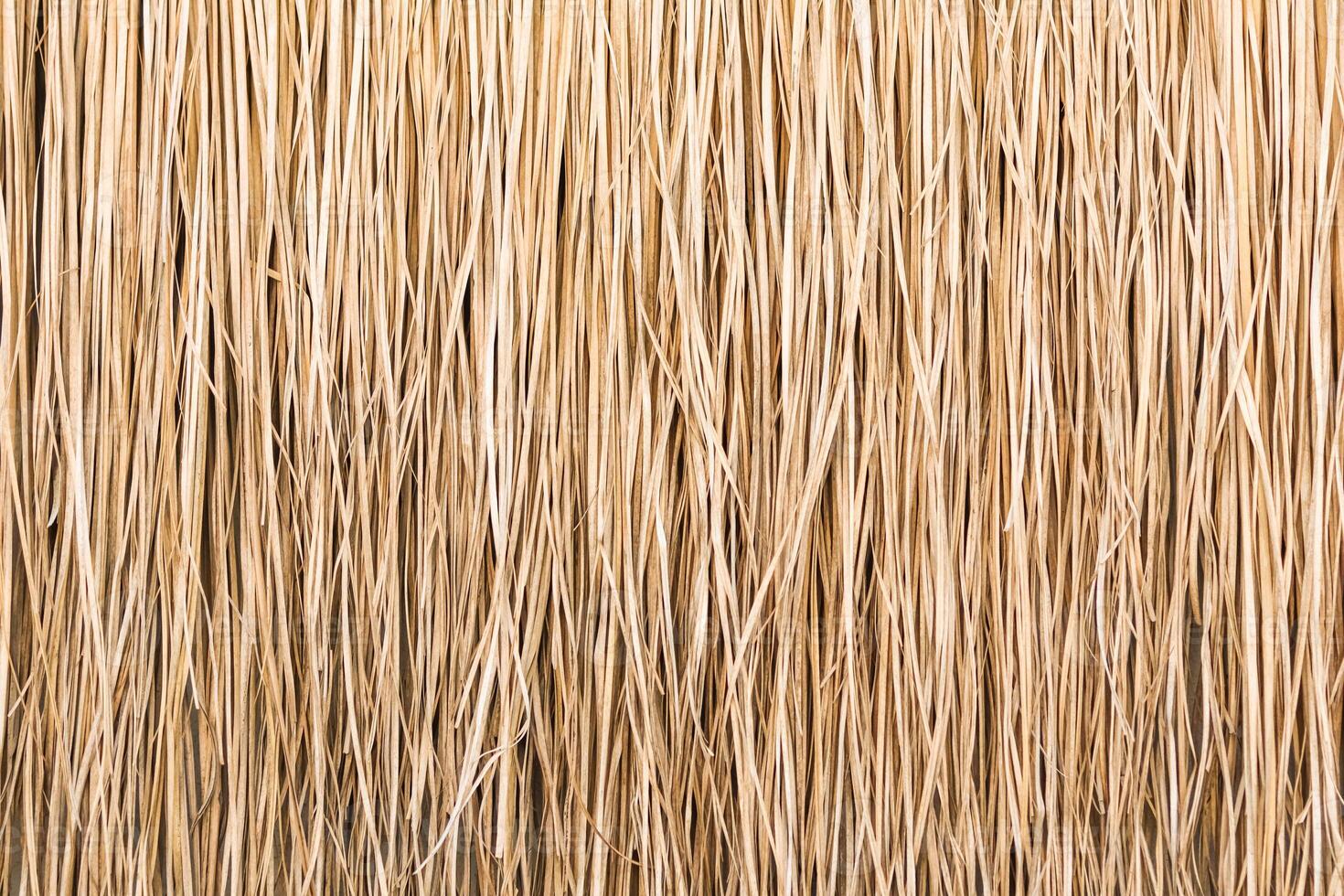 Close up of thatch roof or wall background. Tropical roofing on beach photo