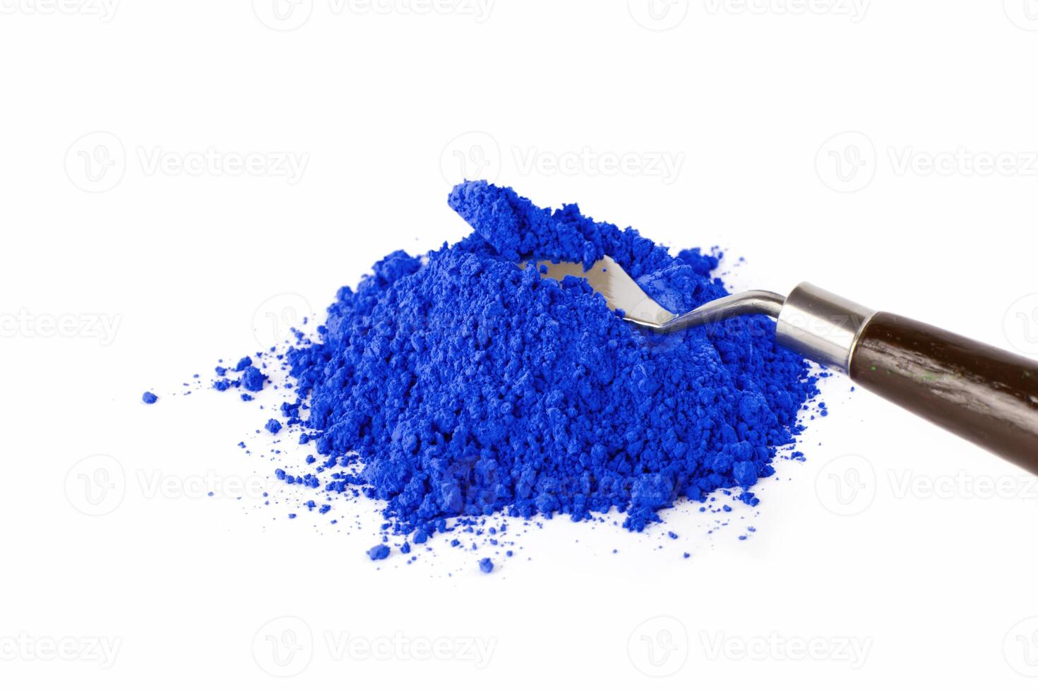 ultramarine pigment, dry paint on a white background photo