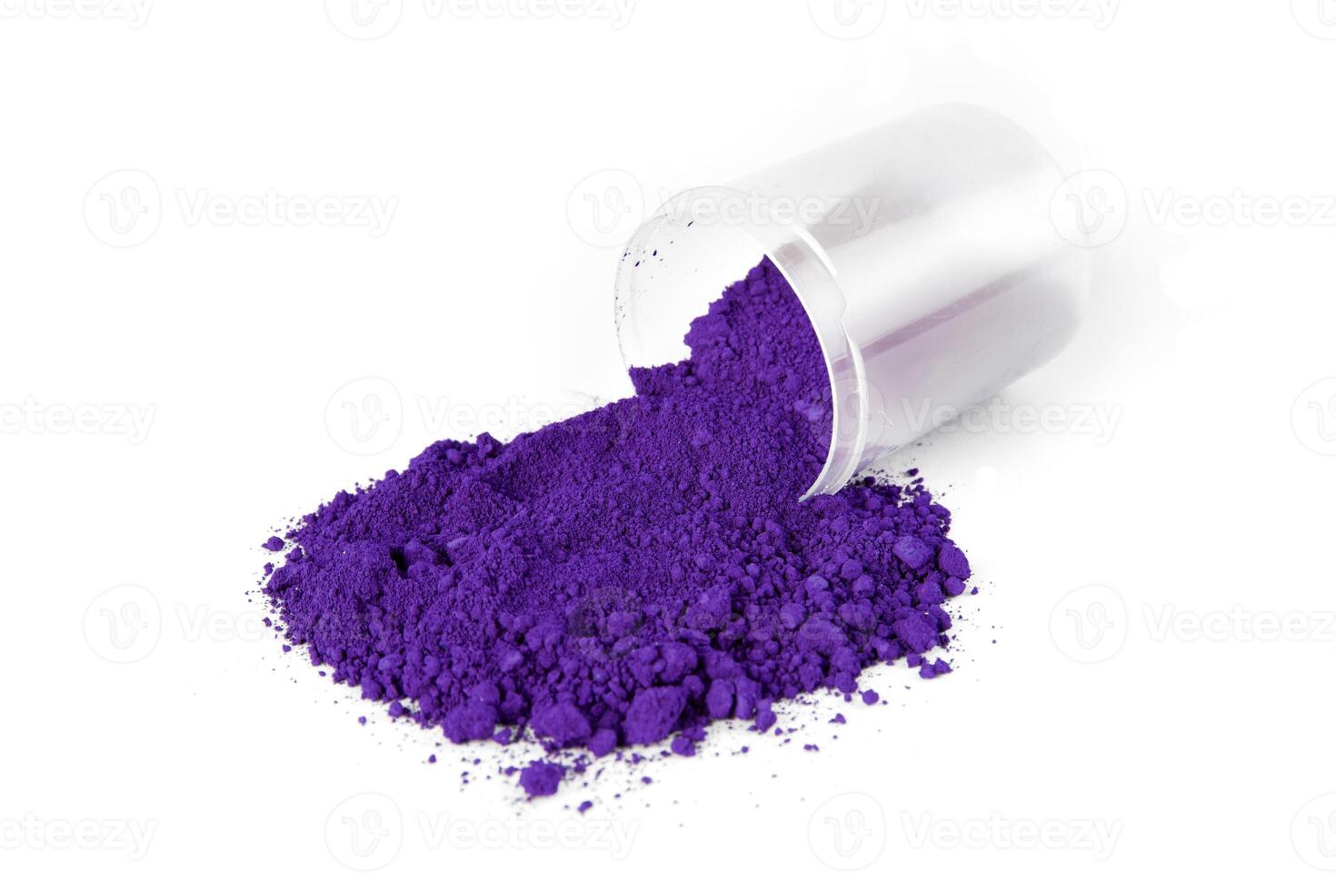 Vibrant Purple Pigment Spills From a Container on a White Background photo