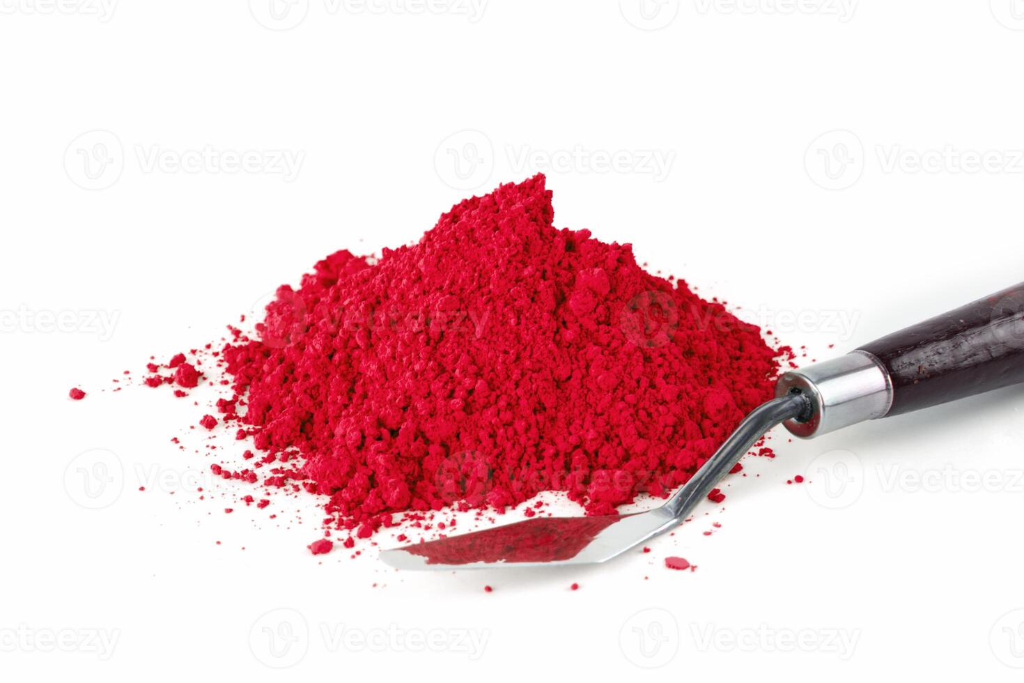 Cadmium Red, Vibrant Red Powder Spills From a Container on a White Surface During Crafting photo