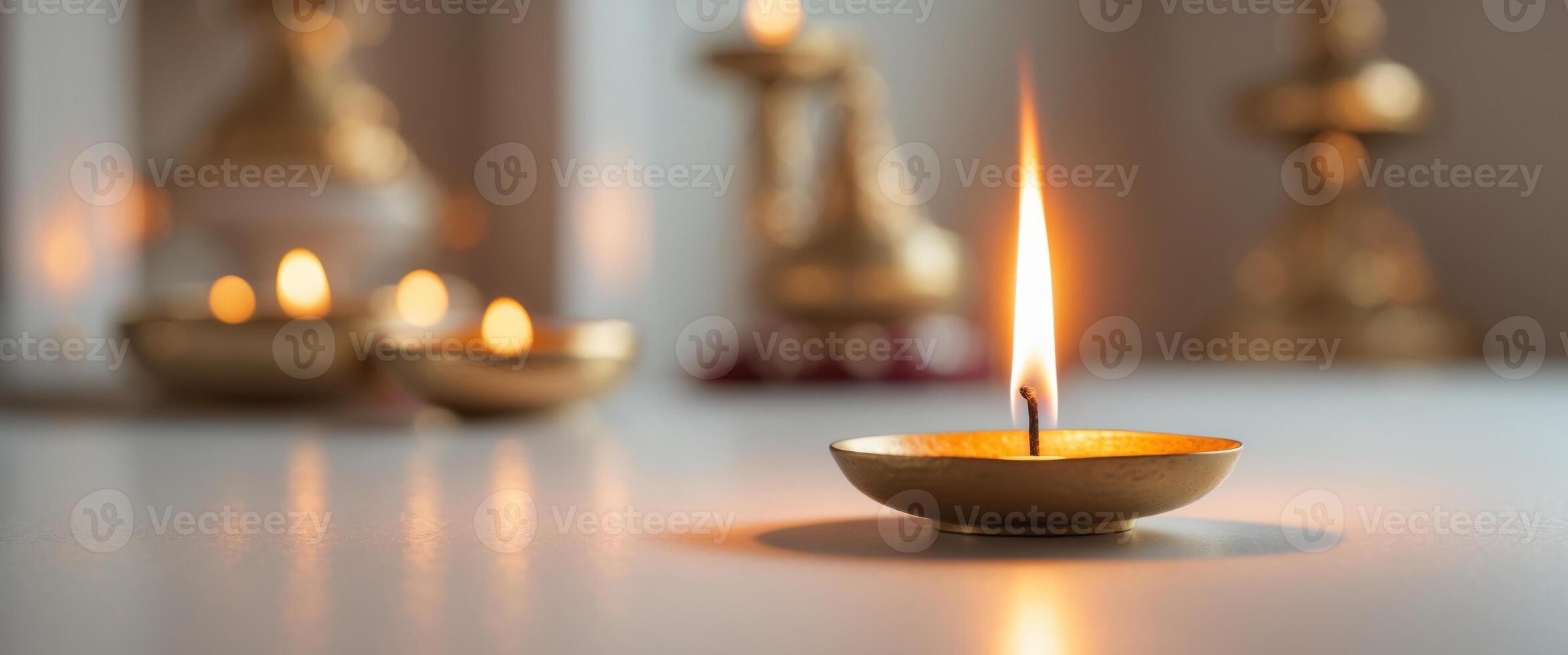 Candle flame illuminating a sacred space during a festive occasion symbolizing devotion and spirituality. photo