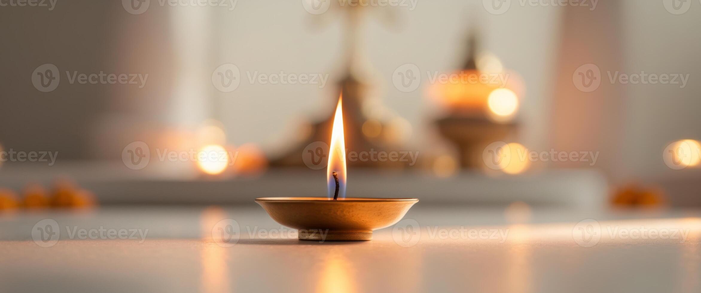 Candle flame illuminating a sacred space during a festive occasion symbolizing devotion and spirituality photo