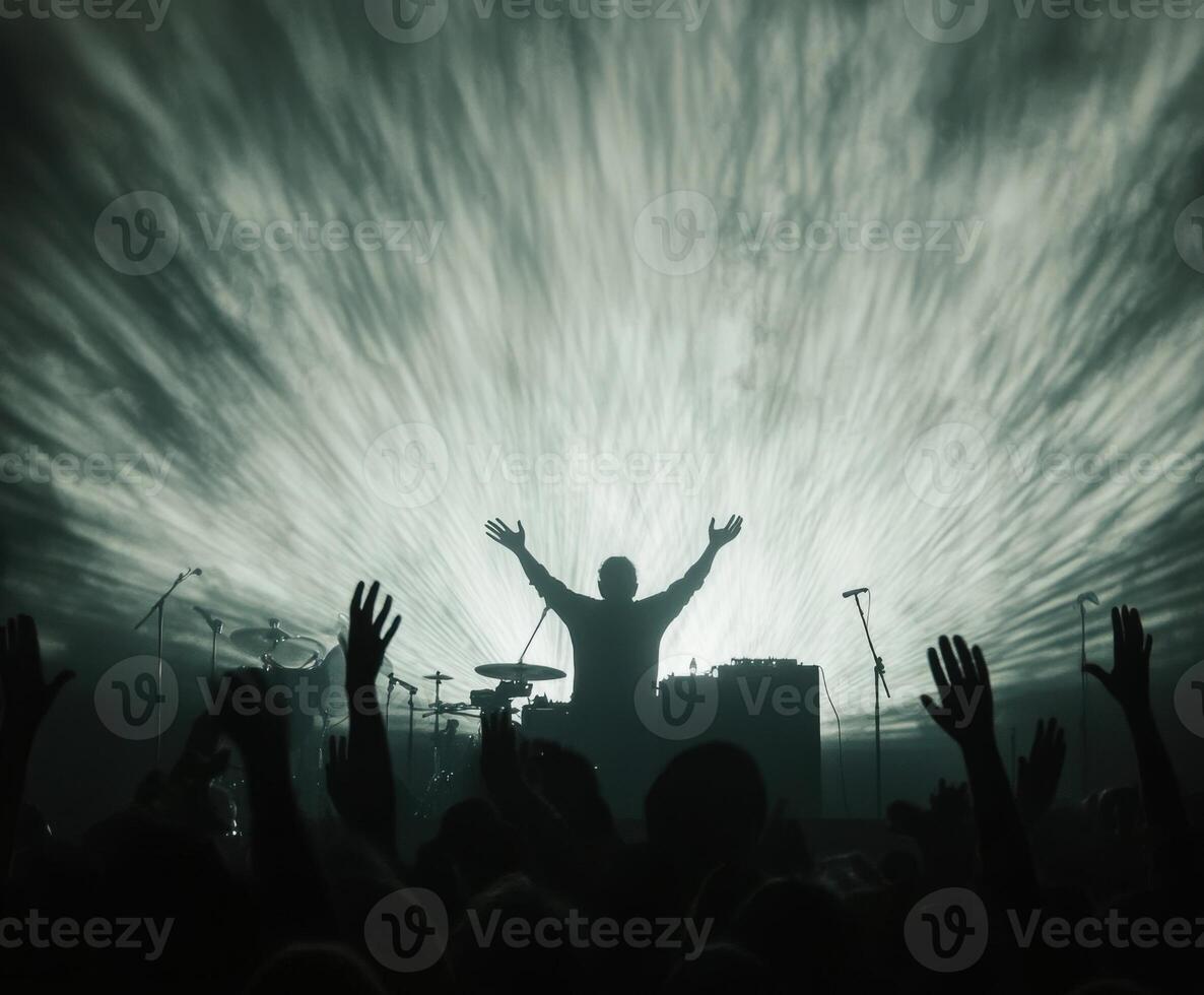 Crowd enjoys a high-energy music performance with dynamic light effects in a concert setting photo