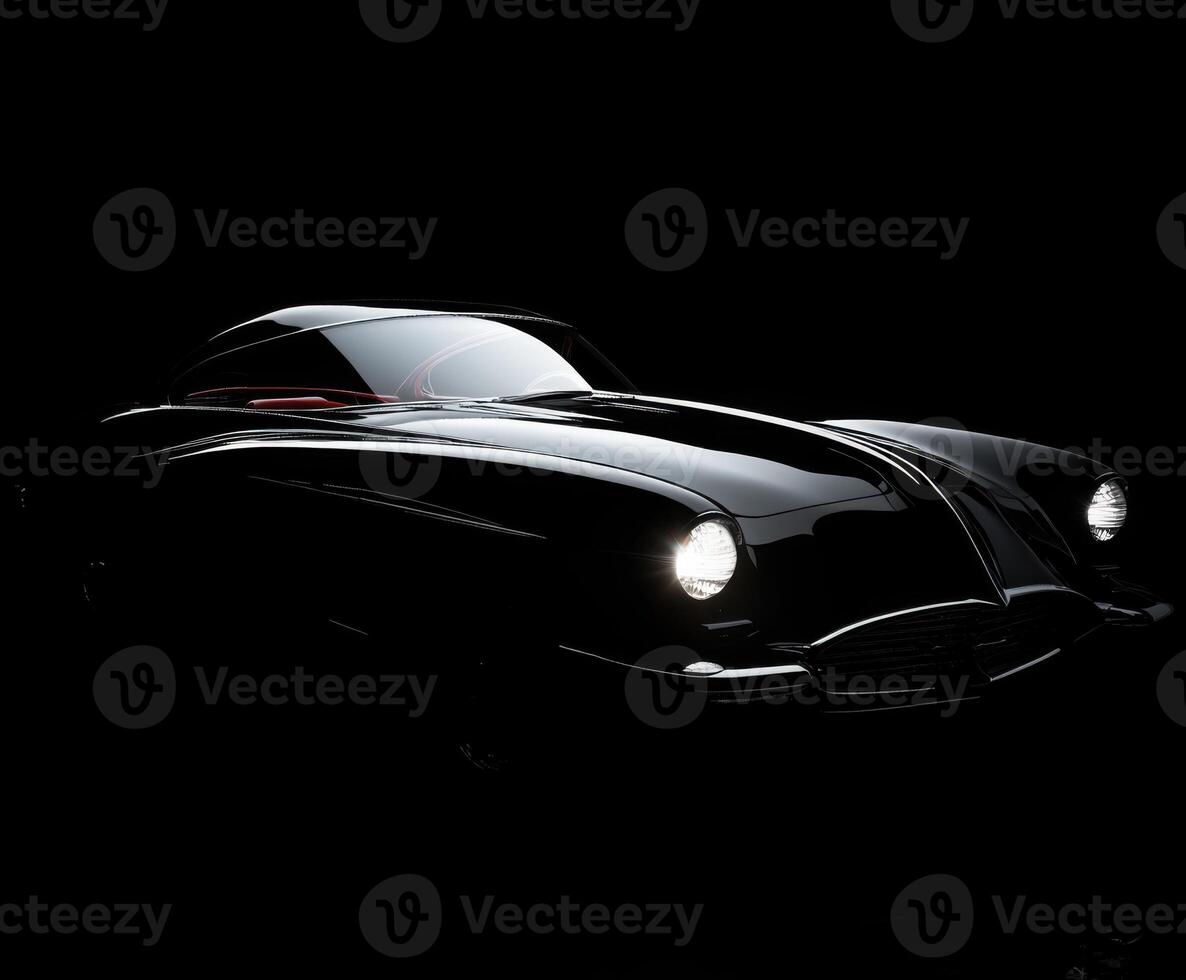 Classic car illuminated in dark setting showcasing vintage design and craftsmanship details photo