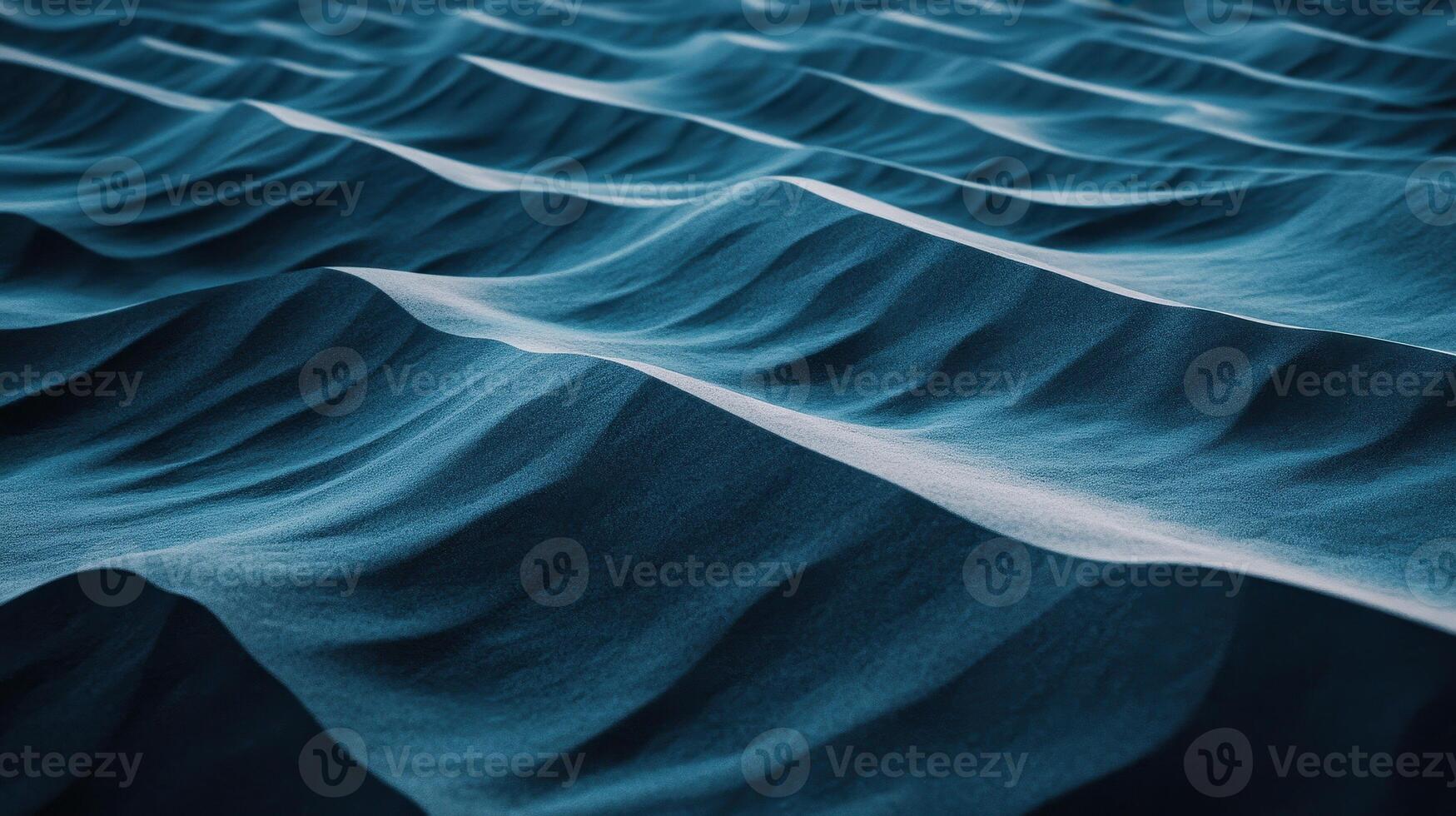 Smooth sand dunes create mesmerizing pattern, showcasing gentle waves and soft textures under natural light. serene landscape evokes sense of calm and tranquility photo