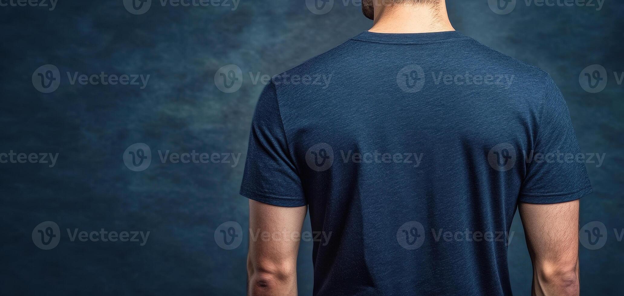 Navy t shirt displayed from back view against textured background, showcasing clean and simple design. Ideal for casual wear or promotional use photo