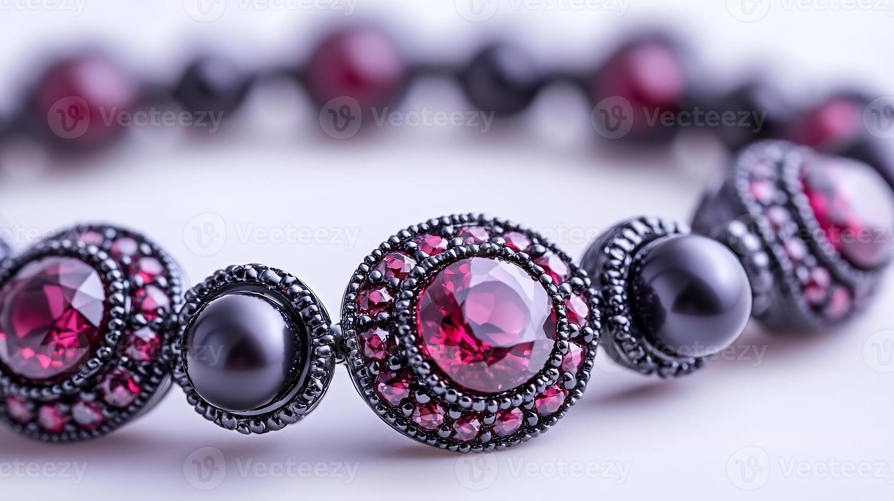Elegant bracelet shimmering rubies and black pearls carefully arranged on a fine silver chain closeup view capturing each gem's texture on a white background photo