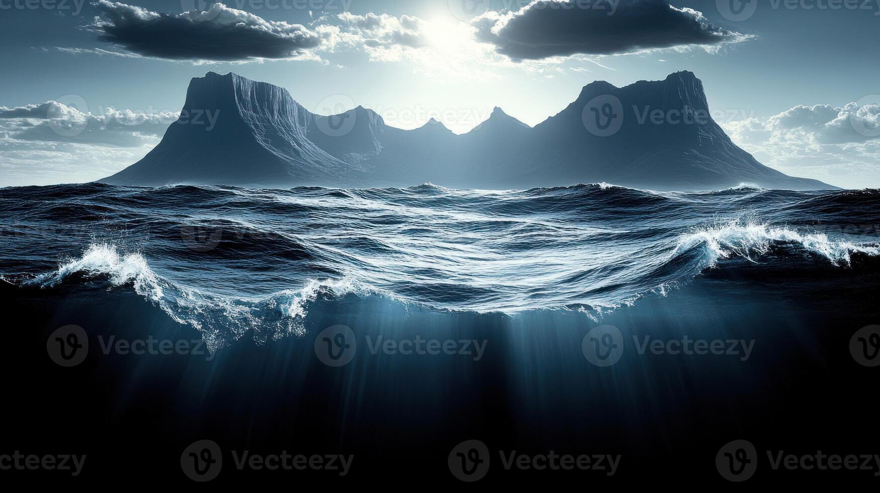Waves cascade gently as the sun sets, illuminating towering peaks in an ethereal glow photo
