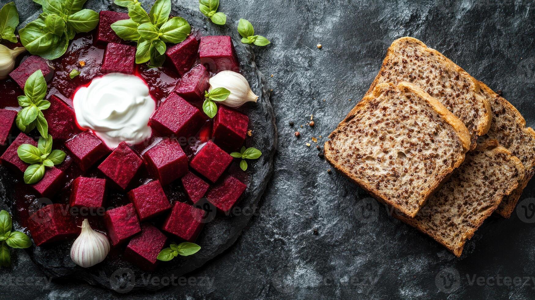 Colorful beetroot cubes with herbs and yogurt beside whole grain bread make a vibrant dish photo