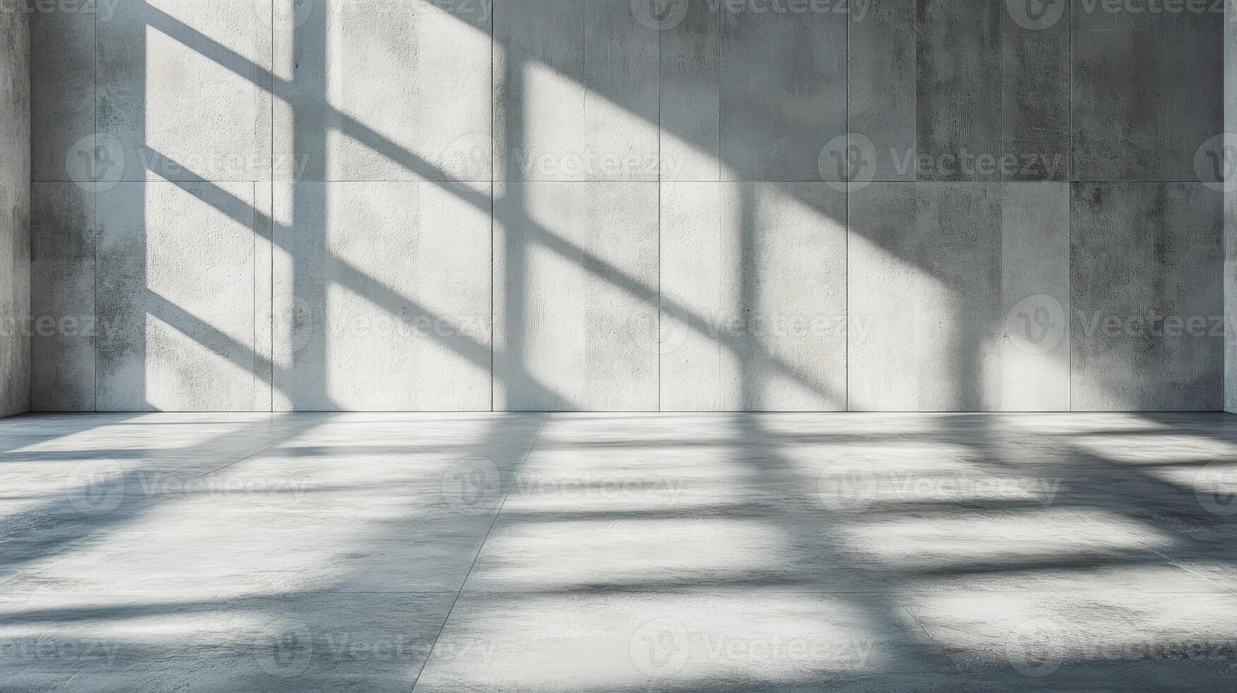 Bright sunlight casts intricate shadows across a spacious concrete area, creating artful patterns photo