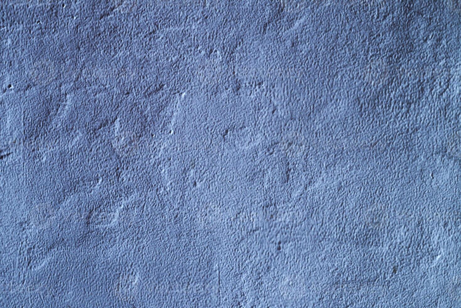 Blue textured varnish with light effects and shadows. photo