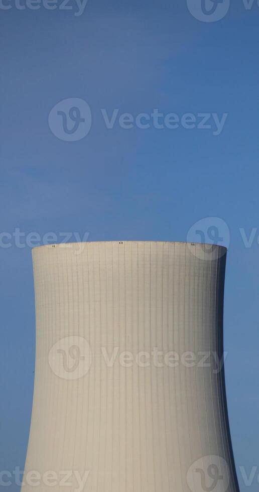 Cooling tower and clear blue sky. photo