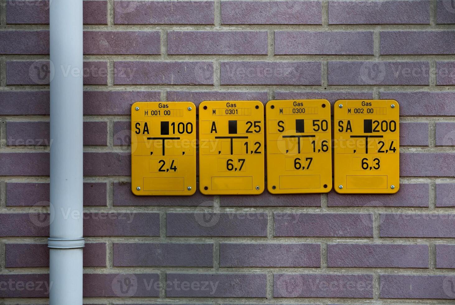 Gate valve sign for natural gas pipes in Germany. The abbreviation on the top left specifies the type of gate valve. The other numbers give size and position of the pipe photo