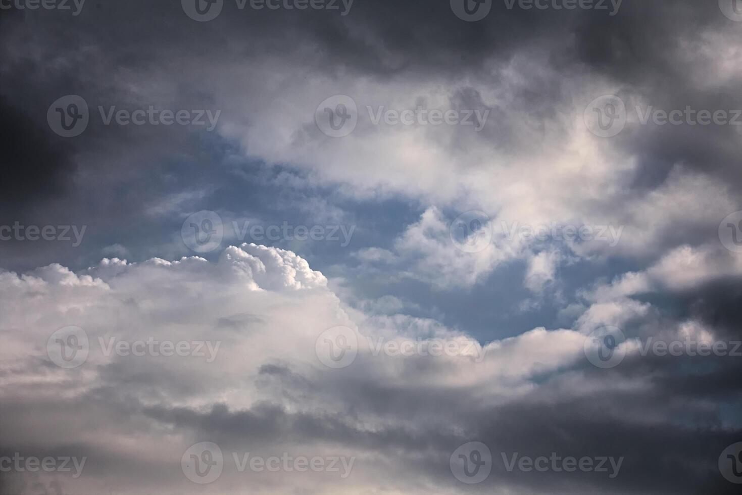High contrast cumulus cloudscape with blue sky. photo