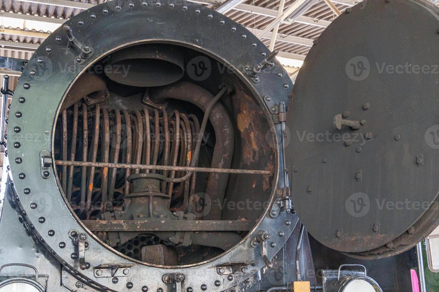 A close up of a train engine with a large open door photo
