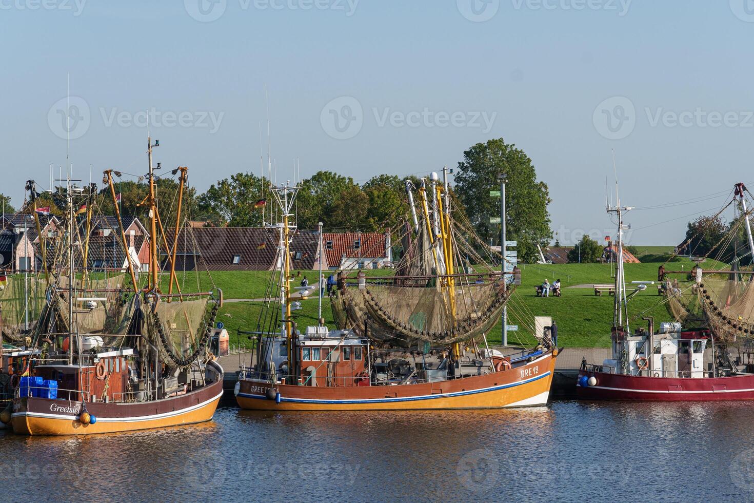 old harbor in the german krummhoern at the north sea photo