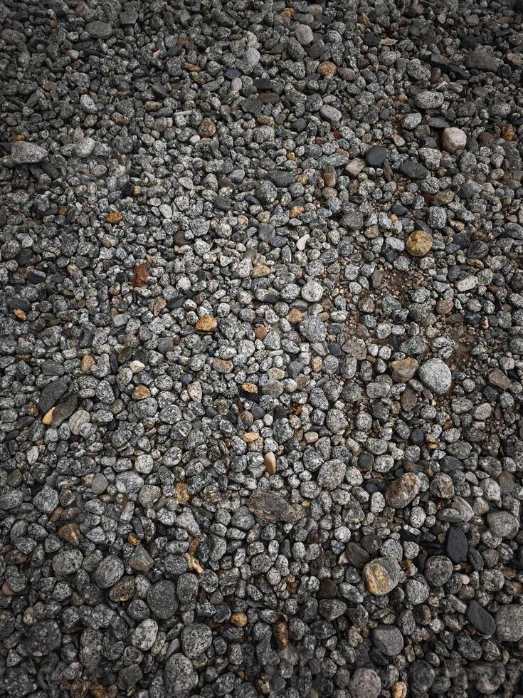 Gravel surface forming textured background in chamonix, france photo