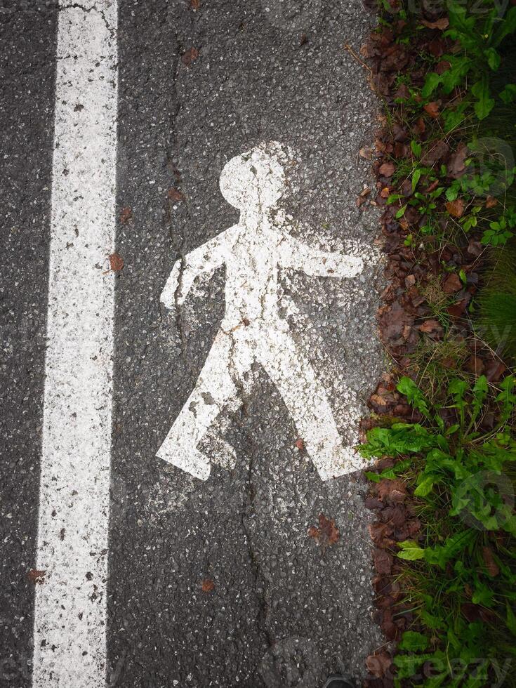 Pedestrian walking sign marking a path in chamonix, france during autumn photo