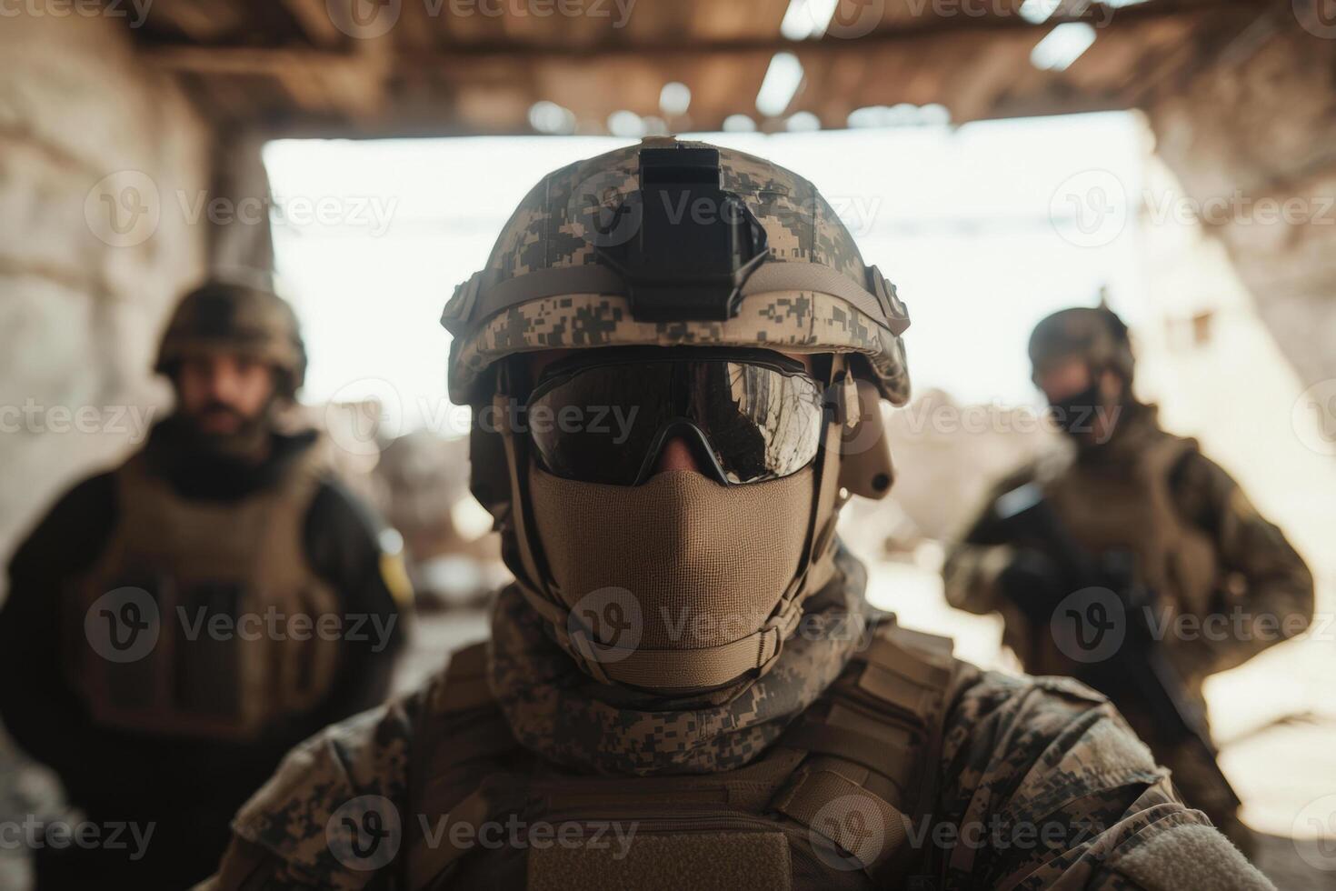 Military personnel in tactical gear pose for a group portrait in a war-torn building during a training exercise at sunrise photo