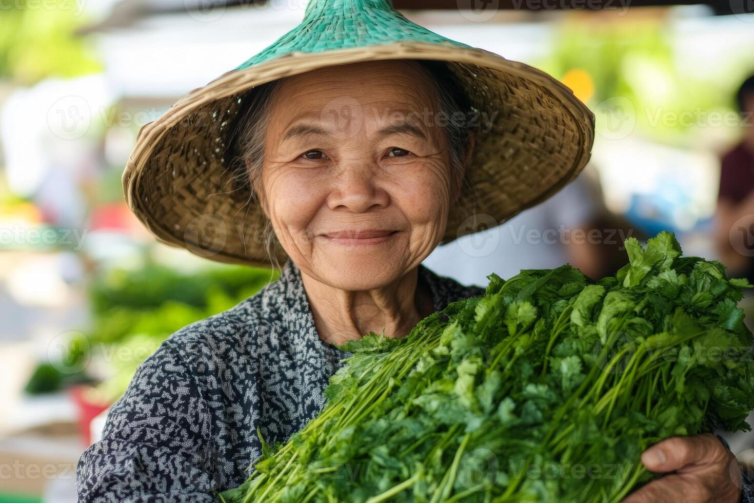 Elderly woman selling fresh cilantro at a local market on a sunny day in a vibrant community setting photo