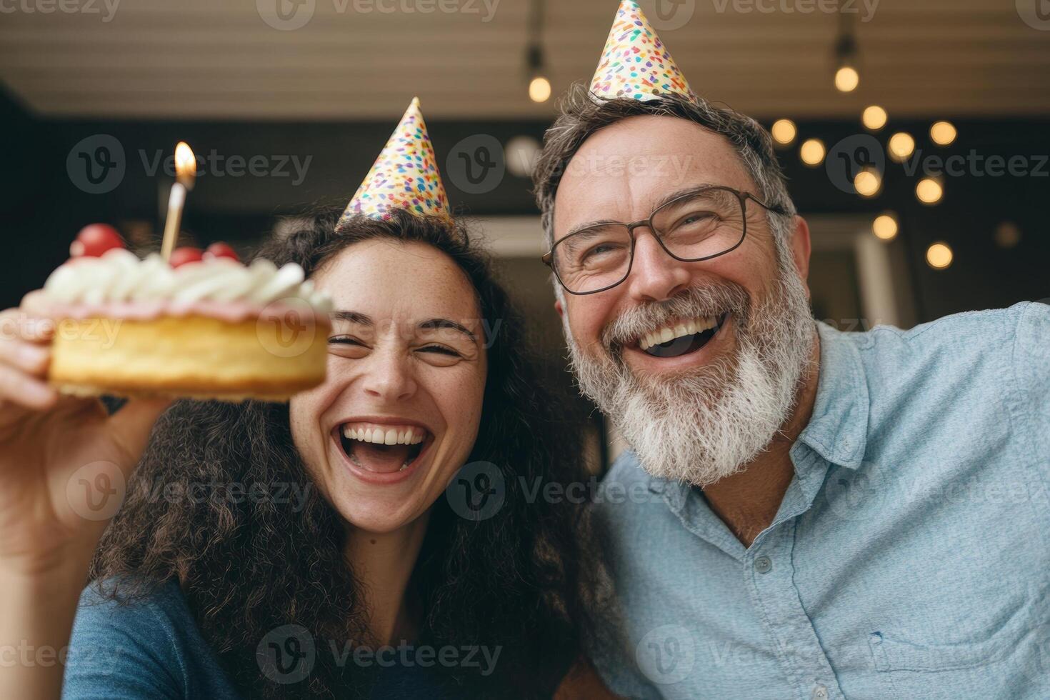 Cheerful celebration at home with friends wearing party hats and enjoying a birthday cake filled with joy and laughter photo