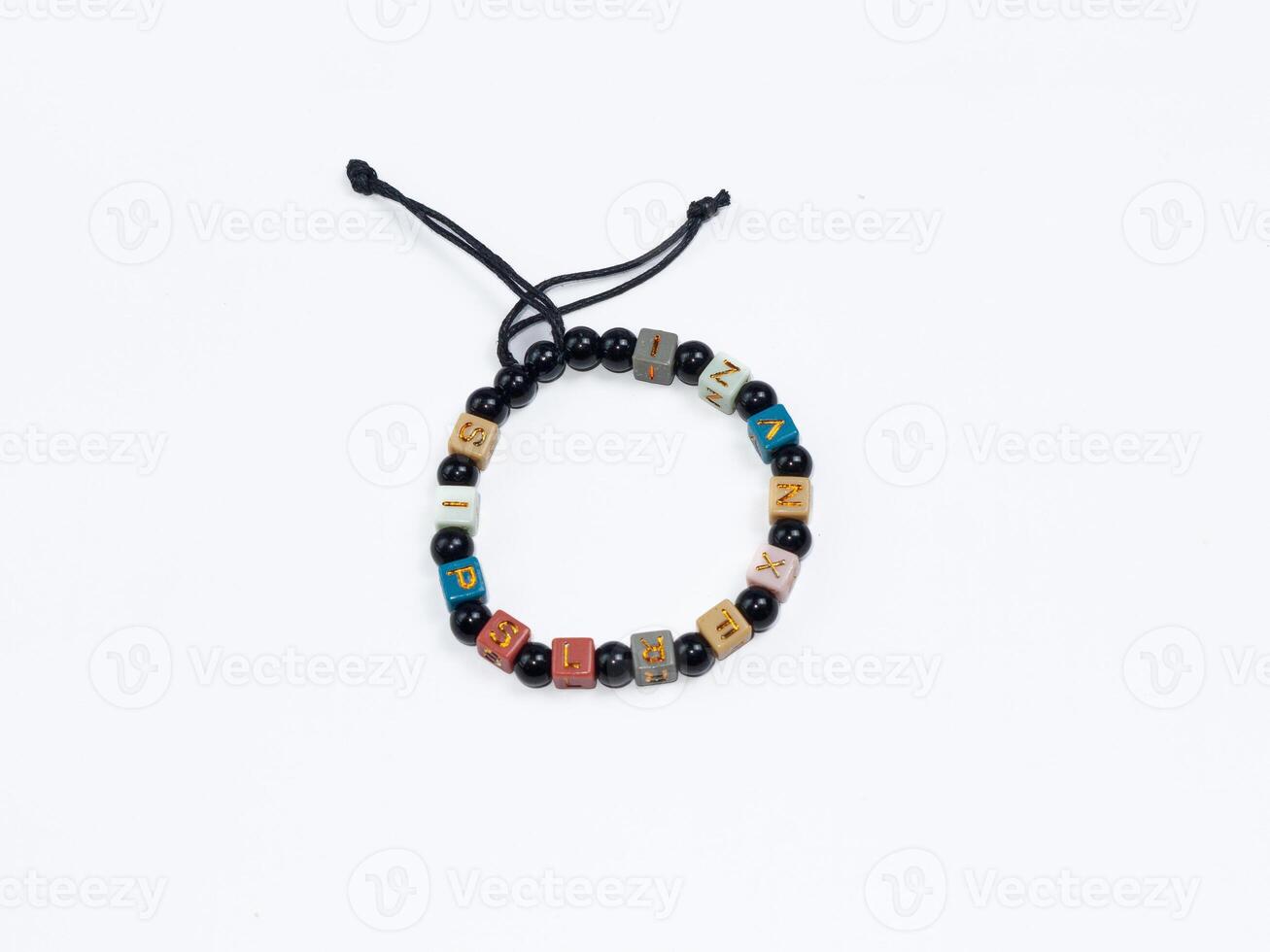 Colorful bracelet made of unique beads, with adjustable string for a perfect fit. Perfect for gift or personal use. photo
