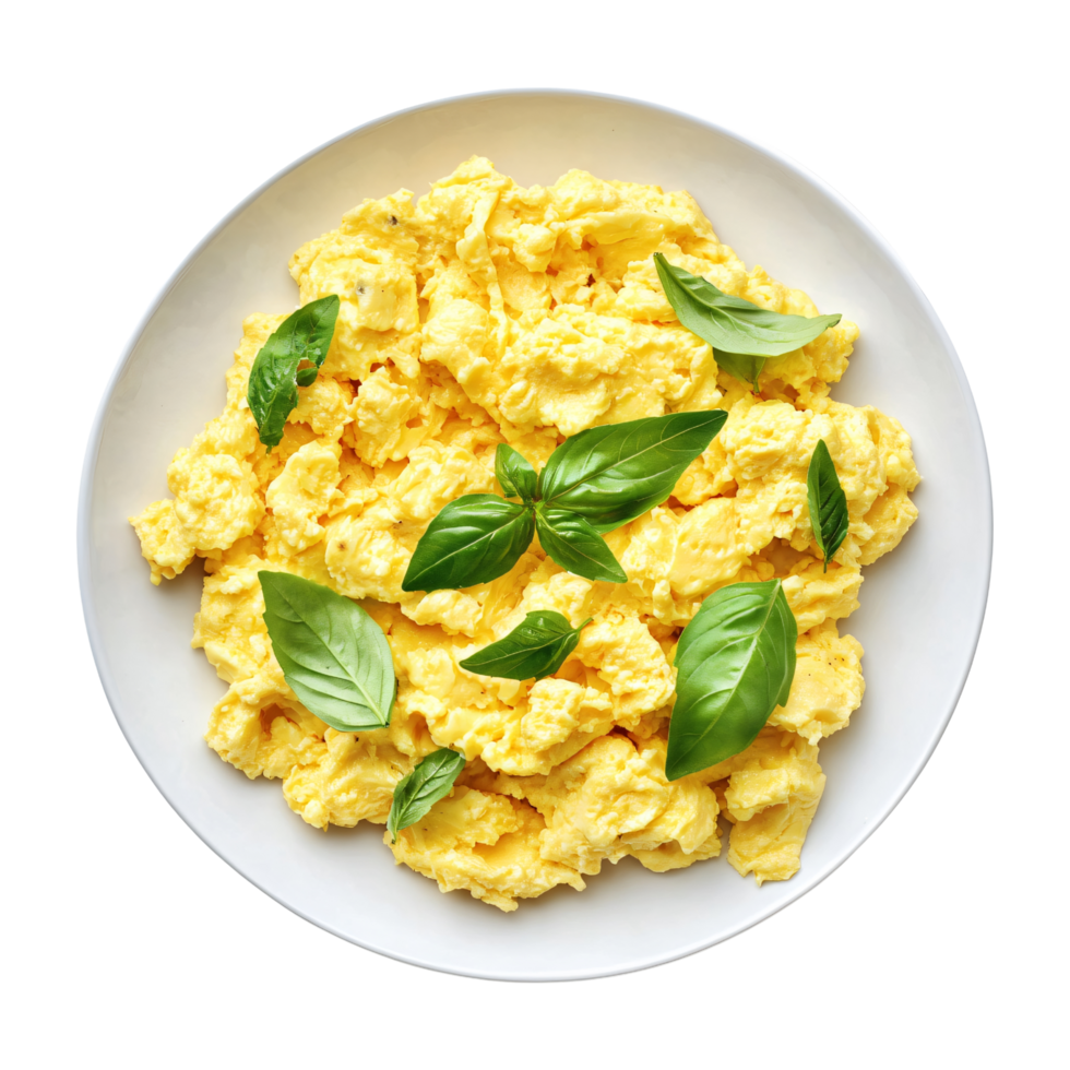Plate of scrambled eggs garnished with fresh basil leaves isolated on transparent background png