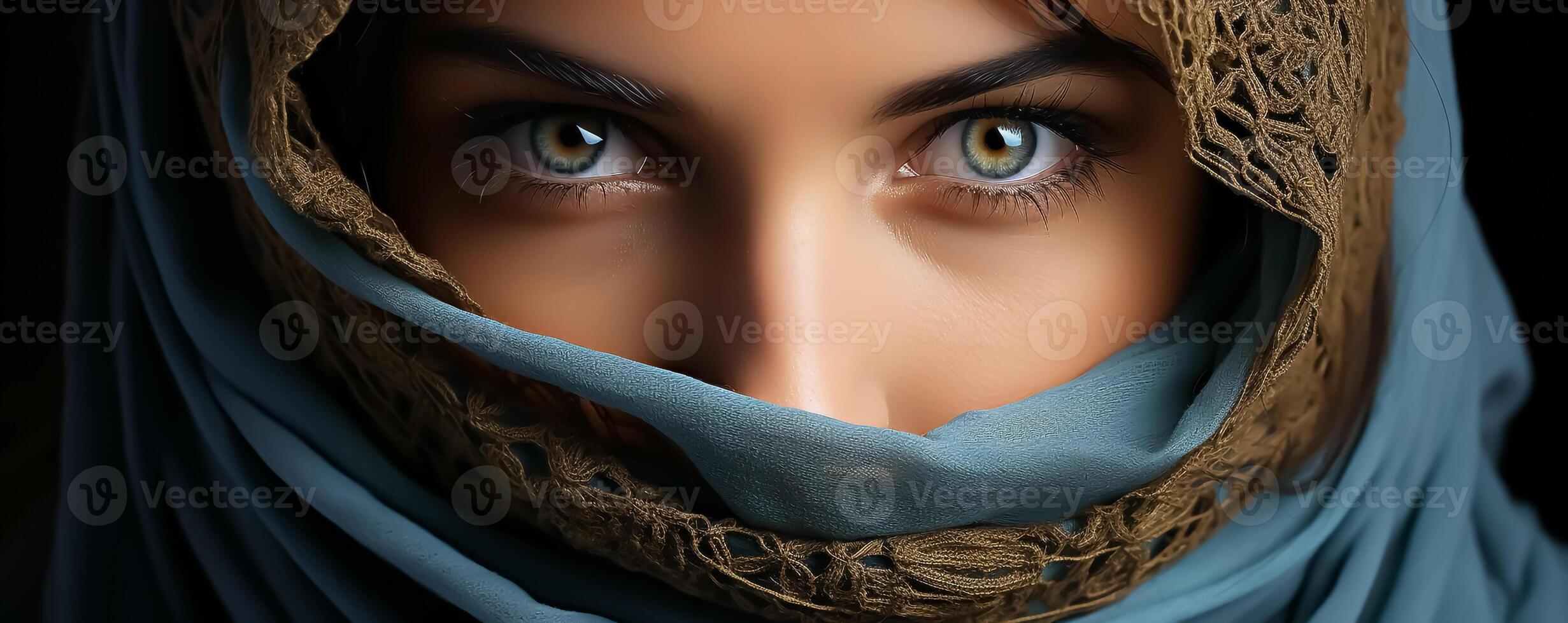 Portrait of a woman with her face covered by a veil. Captivating elegance style, with soft makeup photo
