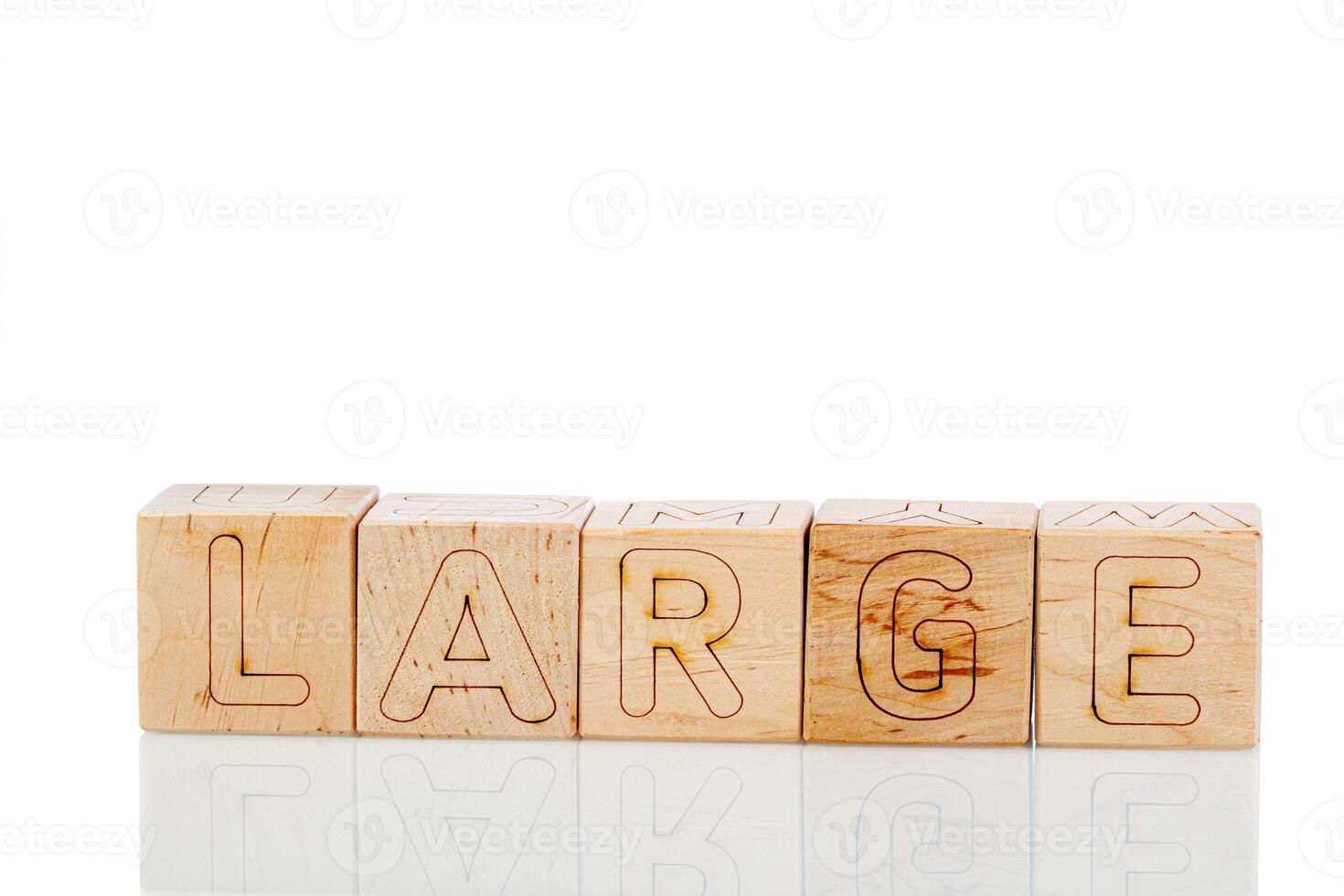 Wooden cubes with letters large on a white background photo