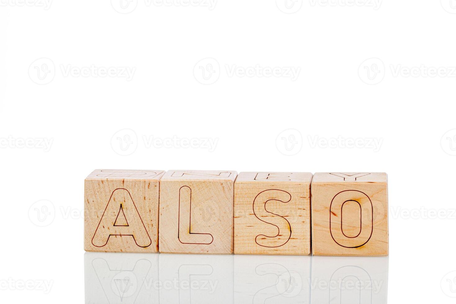 Wooden cubes with letters also on a white background photo