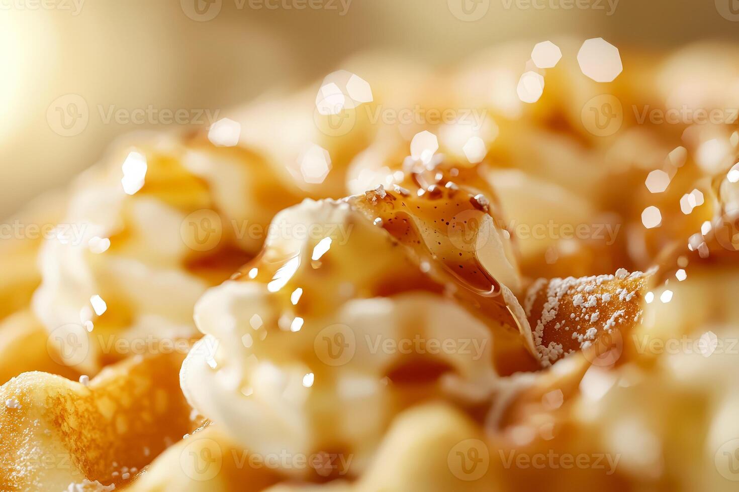 Waffle covered in syrup and powdered sugar photo