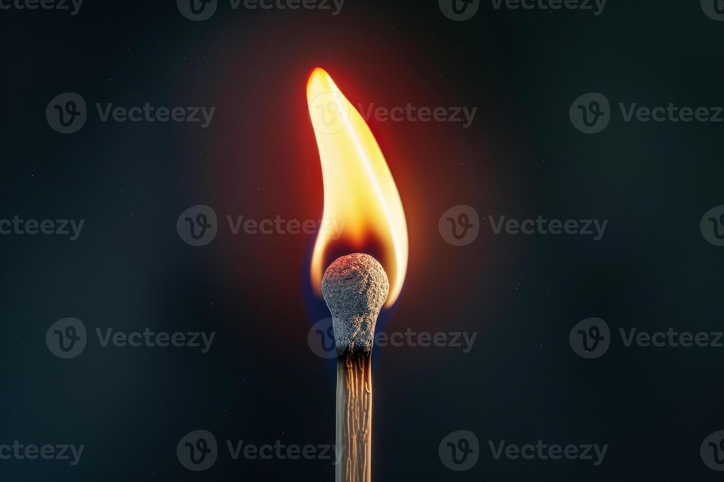 A matchstick is lit and the flame photo