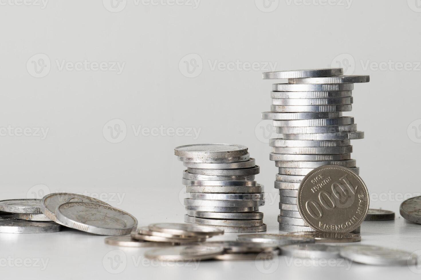 Coins scattered on the table for copy space photo
