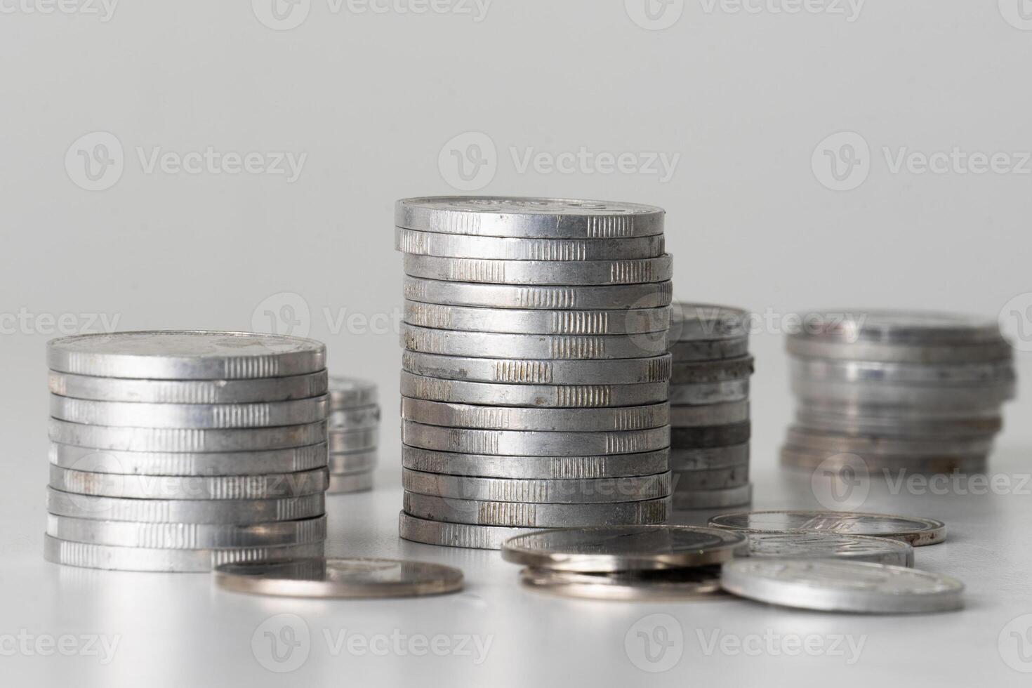 Stack of coins on the table backdrop photo