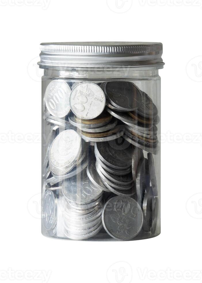 Coin in jar isolated on white photo