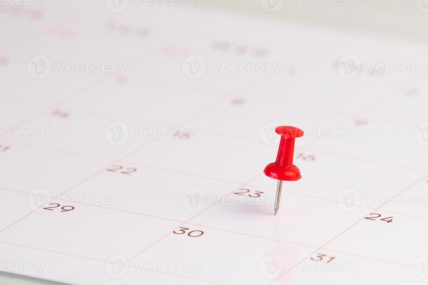 red pin stack on calendar for background photo
