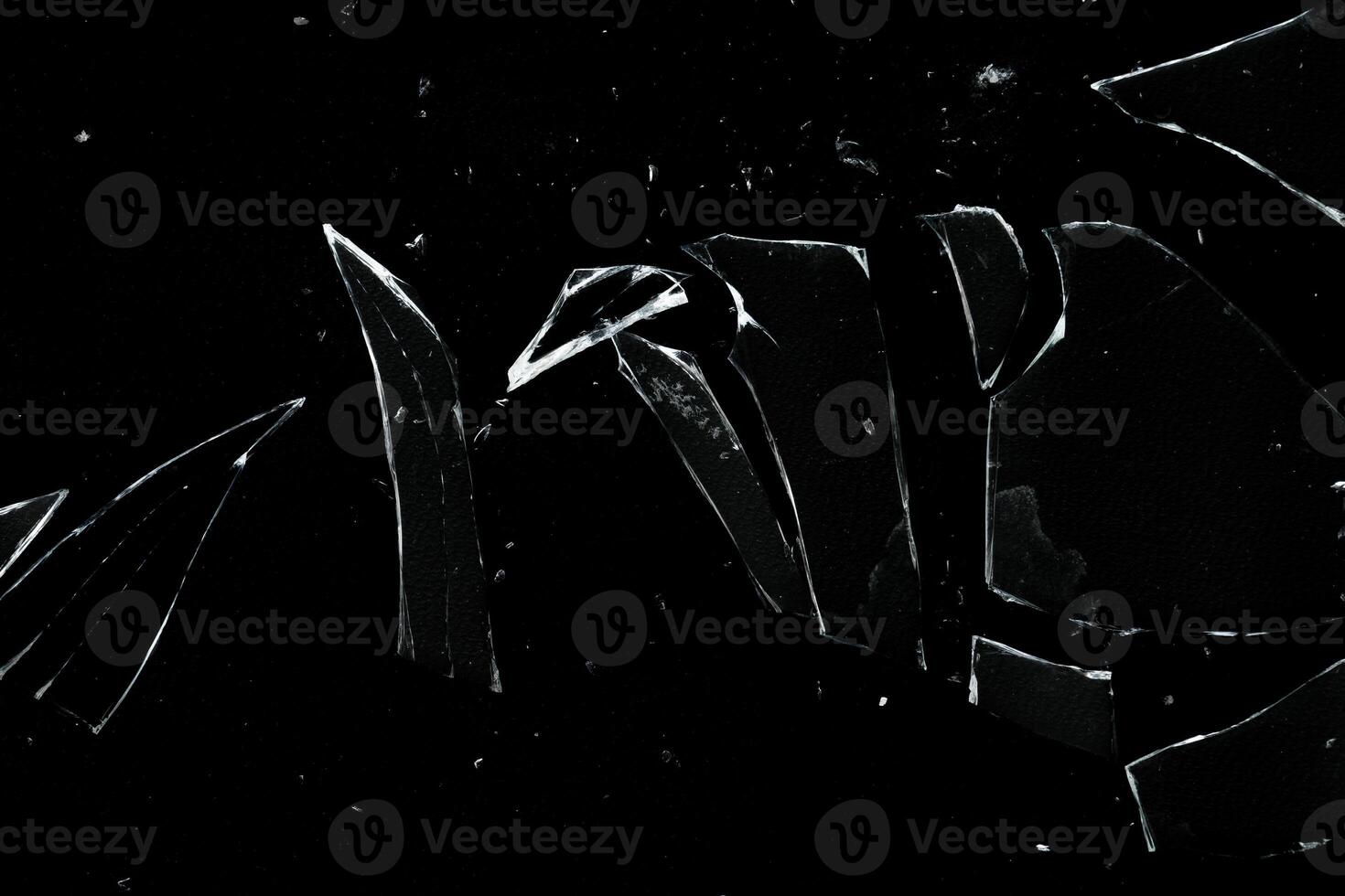 Sharp broken glass texture with particle and dust overlay photo