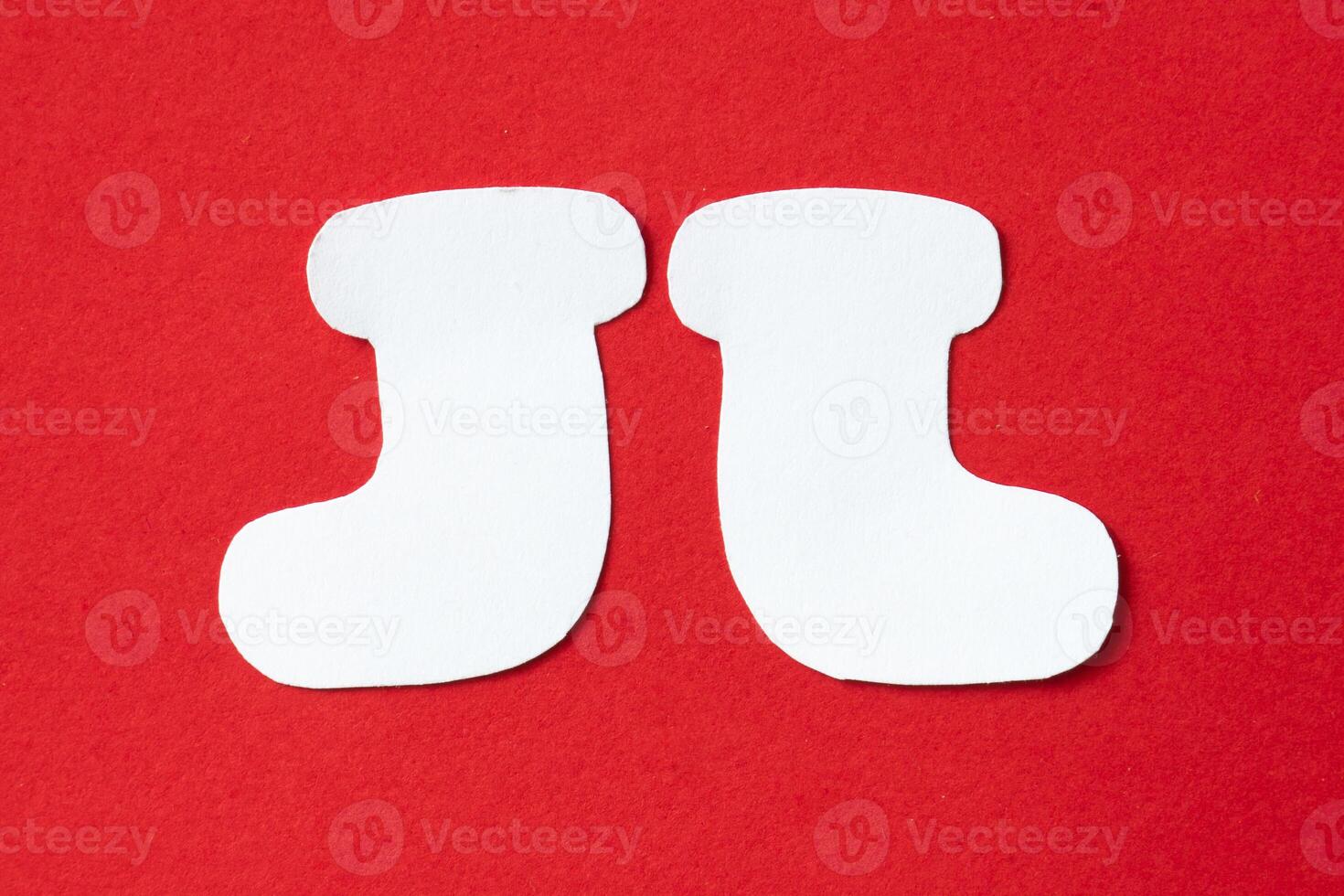 Pair of sock in paper cut out craft photo