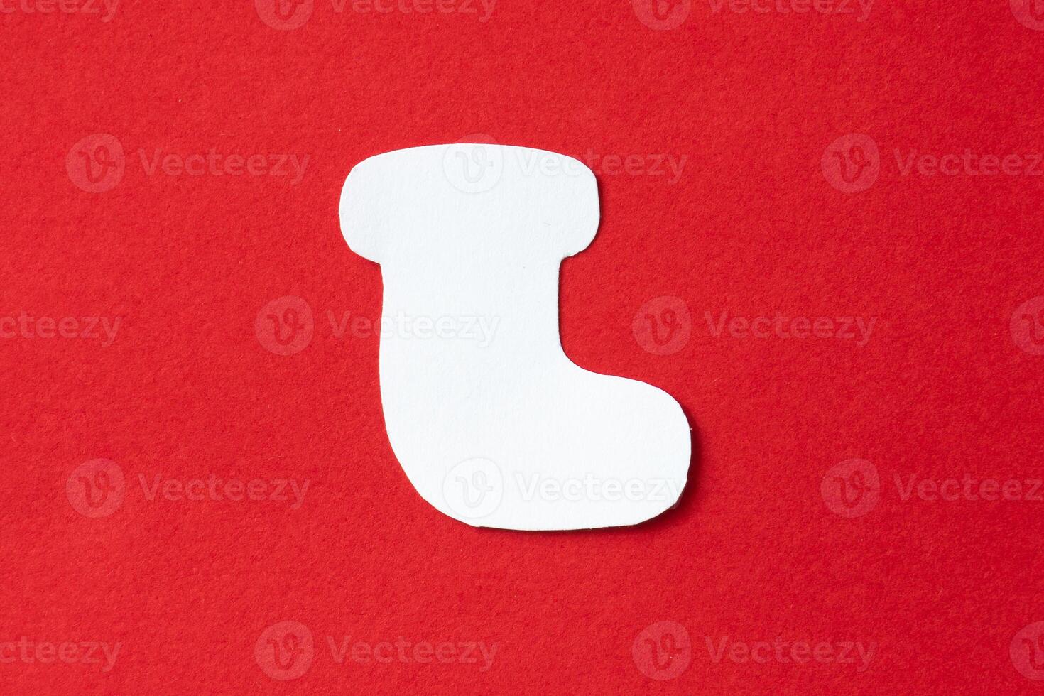 Winter sock in paper cut out craft photo