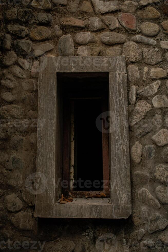 Abandoned Window with Weathered Details photo