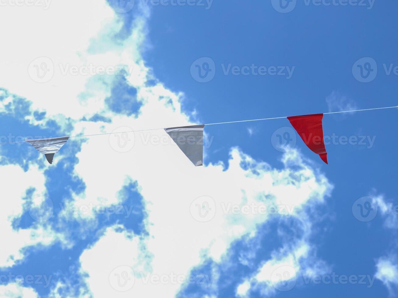 flag rail with blue sky background at noon photo