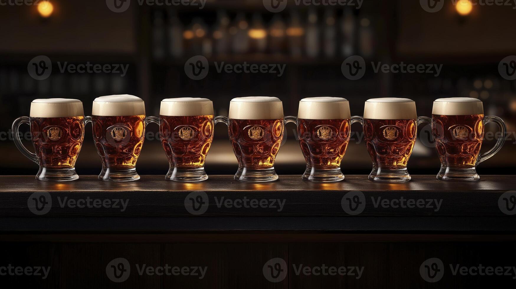 Glasses of beer on a wooden table in a pub or restaurant photo